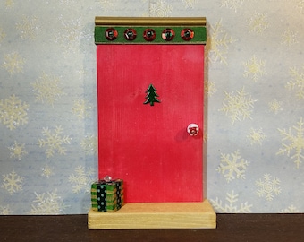 Red Elf Door with Metallic Tree and Christmas Present