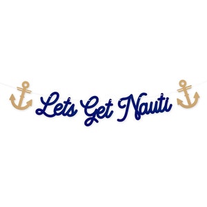 May include: A nautical-themed banner with the phrase "Lets Get Nauti" in navy blue script. Two gold anchor cutouts flank the text. The banner is strung on a thin white string, perfect for a party or event.