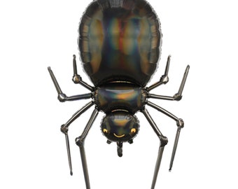 May include: A shiny black spider-shaped foil balloon with an iridescent finish. The spider features a large rounded abdomen, a smaller thorax, and a head with two small yellow eyes and a simple curved yellow line representing a mouth. Eight thin legs.