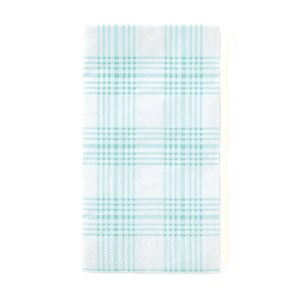 May include: A white paper napkin with a light blue plaid pattern.