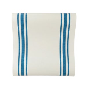 May include: White fabric table runner with three blue stripes down each side.