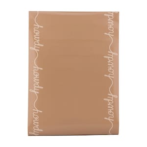 May include: A brown paper envelope with the word "howdy" written on the sides in white.