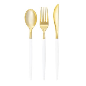 May include: A set of gold-colored flatware with white handles, including a spoon, fork, and knife. The utensils are arranged vertically against a white background, showcasing a modern and elegant design. Ideal for parties and special events.