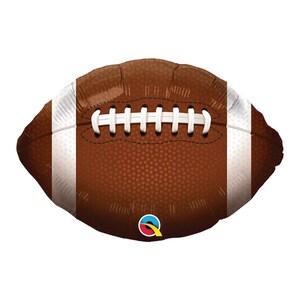 May include: A brown football-shaped balloon with white stripes and laces. The balloon has a textured surface and a small logo at the bottom. Perfect for a football-themed party or event.