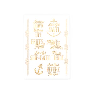 May include: A white card with gold nautical-themed text and illustrations. Phrases include "Anchors Down, Bottoms Up!", "Let's Get Nauti", and "Ship-Faced Bride". Decorative rope and knot borders frame the text.