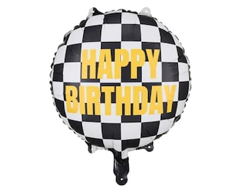 May include: Black and white checkered balloon with the words "Happy Birthday" in yellow letters.