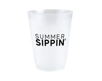 May include: A translucent plastic cup with the words "SUMMER SIPPIN'" printed in black. The cup has a slightly flared rim and a ridged base, suitable for cold beverages.