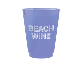 May include: A light purple plastic cup with the words "BEACH WINE" in white block letters. The cup is cylindrical with a slightly flared top and a ridged base. Perfect for outdoor gatherings.