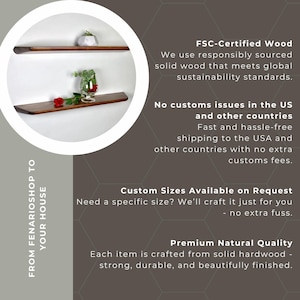 May include: Two horizontal dark brown wooden floating shelves mounted on a white wall. The top shelf holds a small white geometric planter with a green plant. The bottom shelf holds a clear glass vase with green leaves and a single red rose.