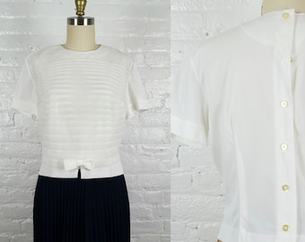 Vintage 1950s white blouse .  pleated 50s back button boxy top  .  medium