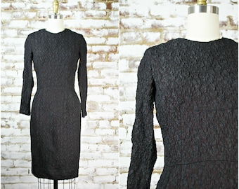 50s black rayon dress . vintage 1950s pin up pencil dress by Carol Craig . hourglass dress.  small
