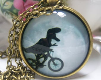 Cute Dinosaur Riding Bicycle Glass Chain Pendant Necklace, T-Rex Whimsical Jewelry Dino Fun Young Gift UNIQUE UNUSUAL Unisex Bike Kids Adult