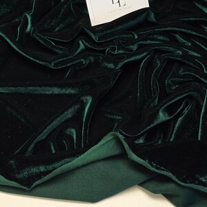 Bottle green smooth stretch velvet velour material