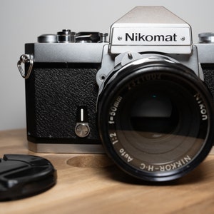 Nikomat FT2 35mm film camera with NIKKOR 50mm f/2 lens and NIKKOR 28mm f/3.5 lens
