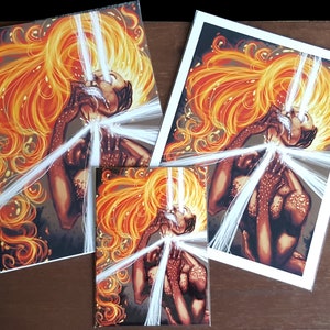 May include: A digital art print of a woman with fiery orange hair and glowing white eyes. The woman is depicted with her hands covering her face, as if in pain or shock. The background is a dark, abstract design.