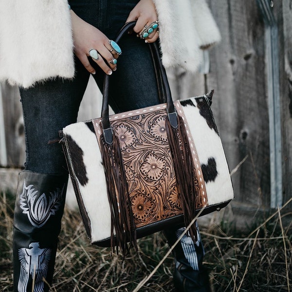 A Clementine é uma bolsa tote de couro bovino trabalhado da Haute Southern Hyde.