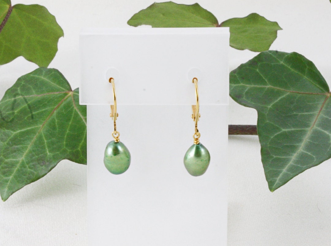 Perla | Handcrafted pearl sage-green ceramic stud earrings