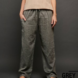 May include: Gray linen pants with a drawstring waist and side pockets.