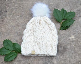 Chunky knit hat in natural cream color, cozy cable knitted beanie with faux fur pom pom, white wool hat for women, woolen winter cap