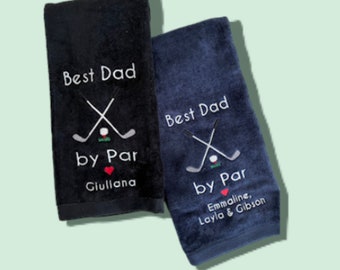 May include: Two dark blue golf towels with white embroidery. The towels say "Best Dad by Par" with a golf club and ball design. One towel has the name "Giullana" embroidered below the design. The other towel has the names "Emmaline, Layla & Gibson" embroidered below the design.