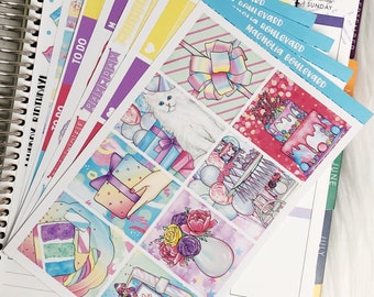 May include: A set of colorful planner stickers featuring a birthday theme. The stickers include a cake, presents, balloons, and the text "Magnolia Boulevard".