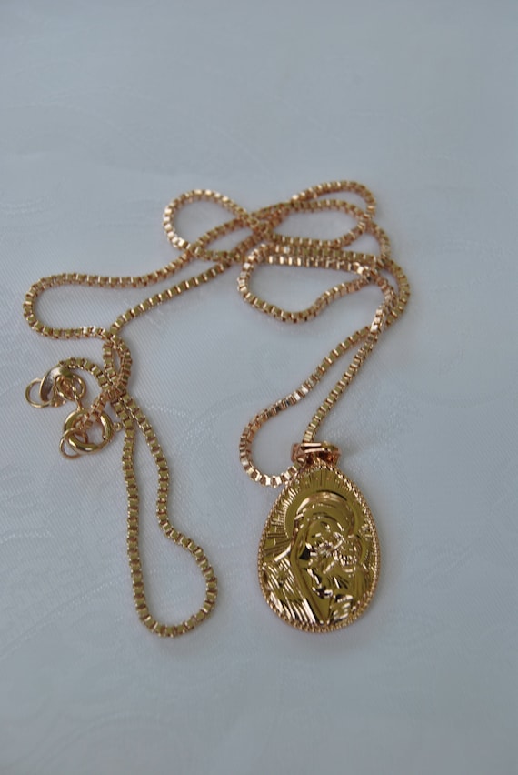 mary and jesus pendant