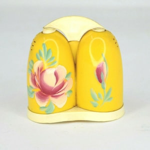 Vintage Art Deco Yelllow Plastic Floral Bullet Shaped Salt And Pepper Shaker