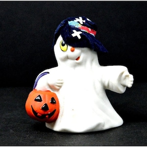 Vintage Small Ceramic Ghost Holding a Jack O Lantern Pumpkin