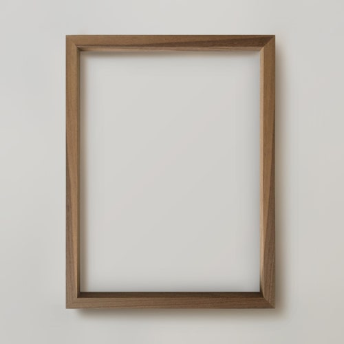 Leonardo, solid walnut frame on shops the wall