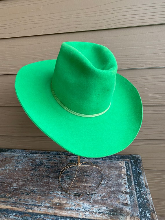 green cowboys hat
