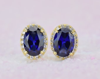 Aretes de zafiro ovalado con halo en oro de 18 quilates: piedra de nacimiento de septiembre