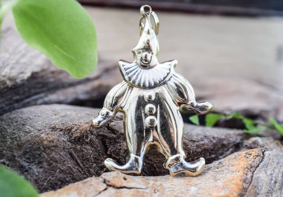 Silver clown pendant deals