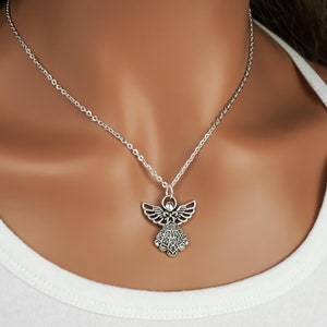Silver angel charm necklace.