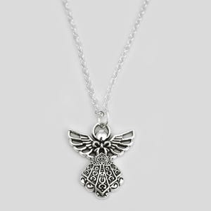 May include: A silver-toned metal necklace featuring an angel-shaped pendant. The pendant displays intricate cut-out detailing on the wings and a decorative filigree pattern on the dress, suspended from a simple, thin silver-toned link chain.