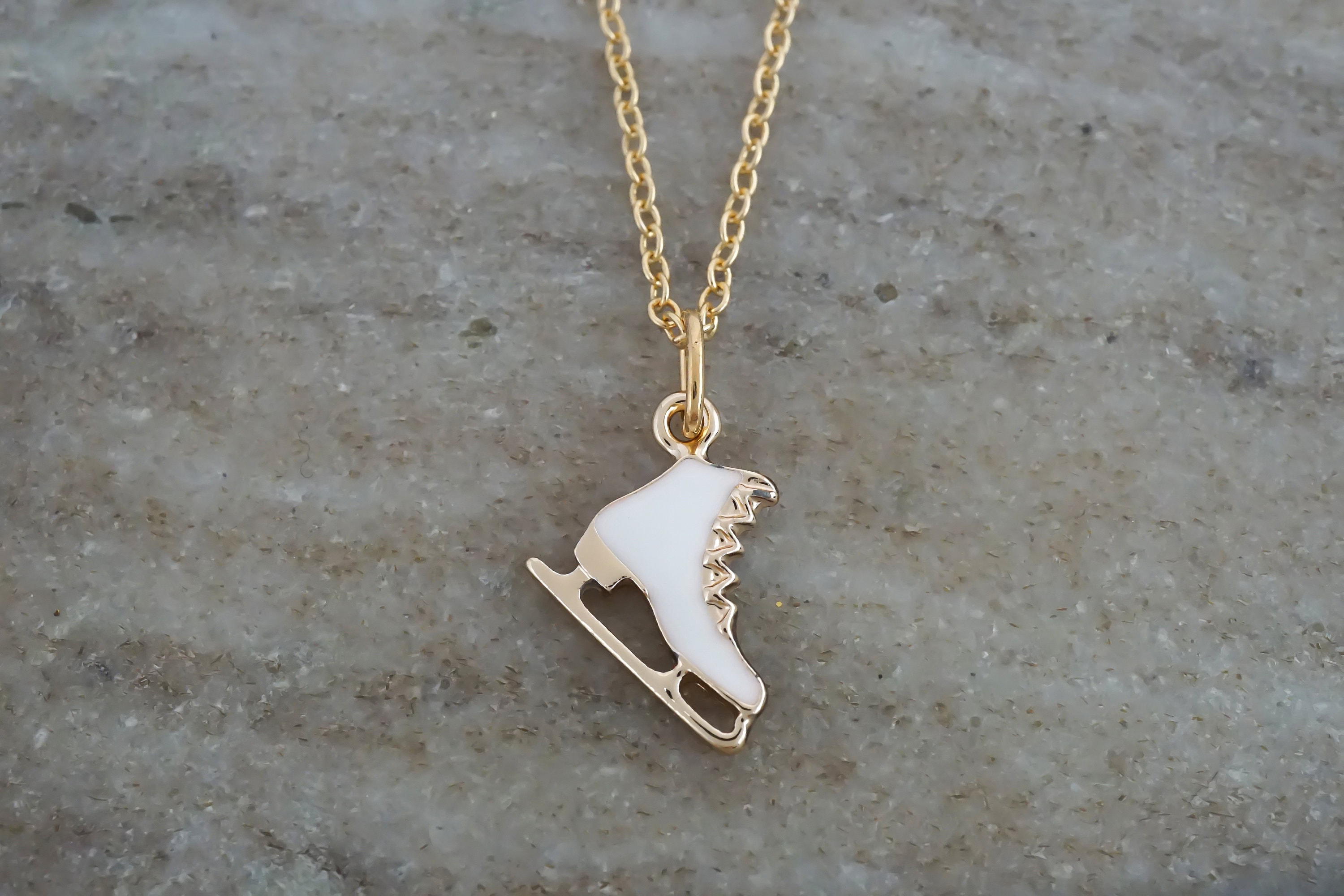 Ice skate pendant best sale