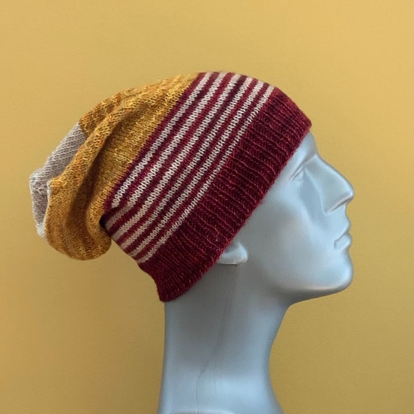 Hand knit slouch hat in 100% superwash Merino wool. Adult/teen medium to medium/large. Red, gold. White