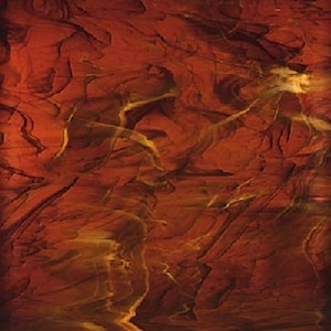 May include: Abstract artwork with a textured appearance. The image features a blend of deep red and brown hues, with streaks of yellow and gold. The design has a layered, organic feel, resembling a geological formation or a close-up of a natural surface.