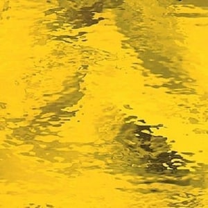 May include: A sheet of yellow textured glass with a rippled, wavy pattern.