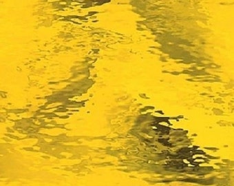 May include: A sheet of yellow textured glass with a rippled, wavy pattern.