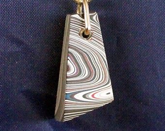 Fordite Keychain - 31.85mm x 16.12mm x 9.41mm          (2896)