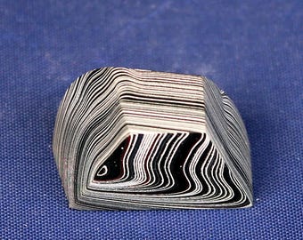 Finished Piece of Fordite - 27.13mm x 21.85mm x 16.95mm          (F-004)