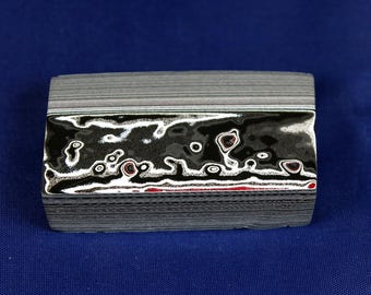 Finished Piece of Fordite - 61.2mm x 36.91mm x 15.48mm          (F-007)