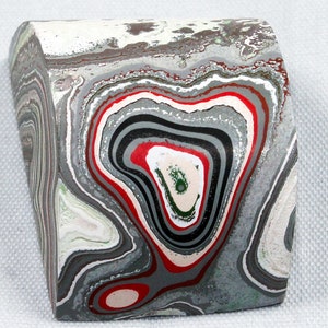 Finished Piece of Fordite - Premium Fordite - 33.86mm x 23.12mm x 15.75mm          (2247)