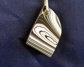 Fordite Keychain - 32.22mm x 22.57mm x 4.26mm          (2852)
