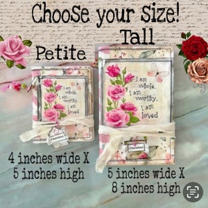 May include: Two fabric-covered journals with pink roses and the text "I am whole, I am worthy, I am loved". The smaller journal is 4 inches wide by 5 inches high and is labeled "Petite". The larger journal is 5 inches wide by 8 inches high and is labeled "Tall".