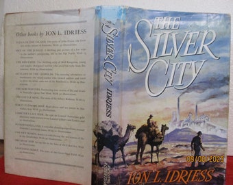 Ion L Idriess THE SILVER CITY 1st edition 1956 hardcover with jacket