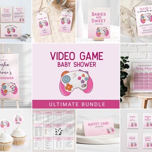 May include: A collection of pink video game-themed baby shower decorations. Includes invitations, thank you cards, cupcake toppers, a welcome sign, a calendar, and buffet cards. The designs feature a game controller.