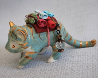 Porcelain green turquoise travelling tiger figurine with gold and fabric luggage - lantern lion carrier feline figurine miniature animal