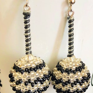Zulu beaded earrings+ Black/Silver beads with a beautiful pattern  +beads +unique style +can be worn with anything