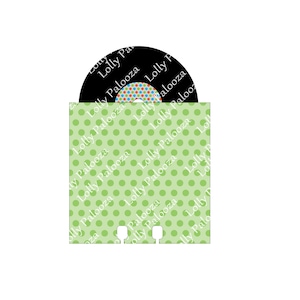 May include: A green and white polka dot record sleeve with a black vinyl record inside. The record has a colorful polka dot design in the center. The text "Lolly Palooza" is repeated around the edge of the sleeve.